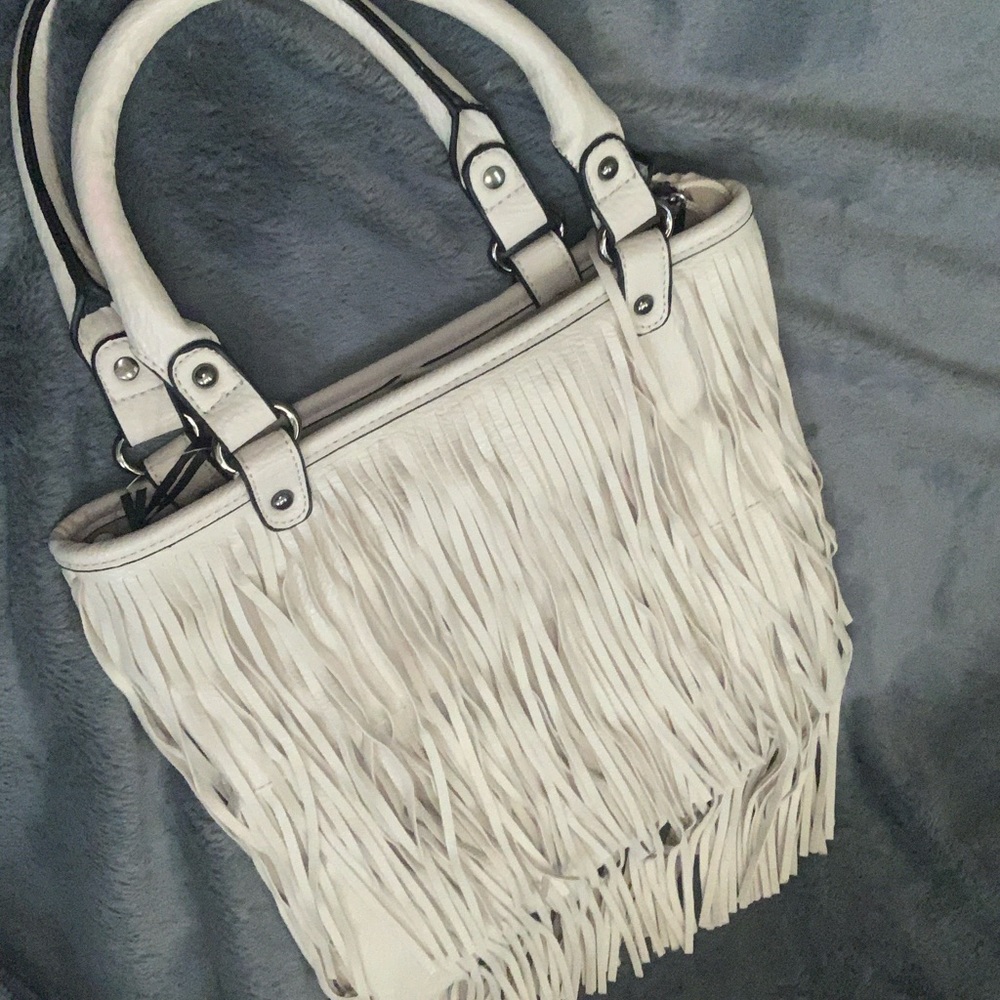 New Fun fringe purses in two colors camel and tan.